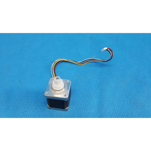 Silver metallic stepper motor with white plastic shaft and multicolored wiring for topcon trc-nw8 fundus camera