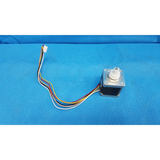 Silver internal sanyo denki stepper motor with white plastic shaft and multi-colored wiring for topcon trc-nw8 fundus camera