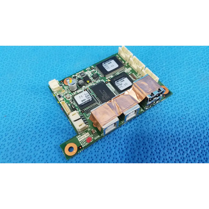Green logic motherboard board with black integrated circuits and copper heat sinks for fundus retinal camera use