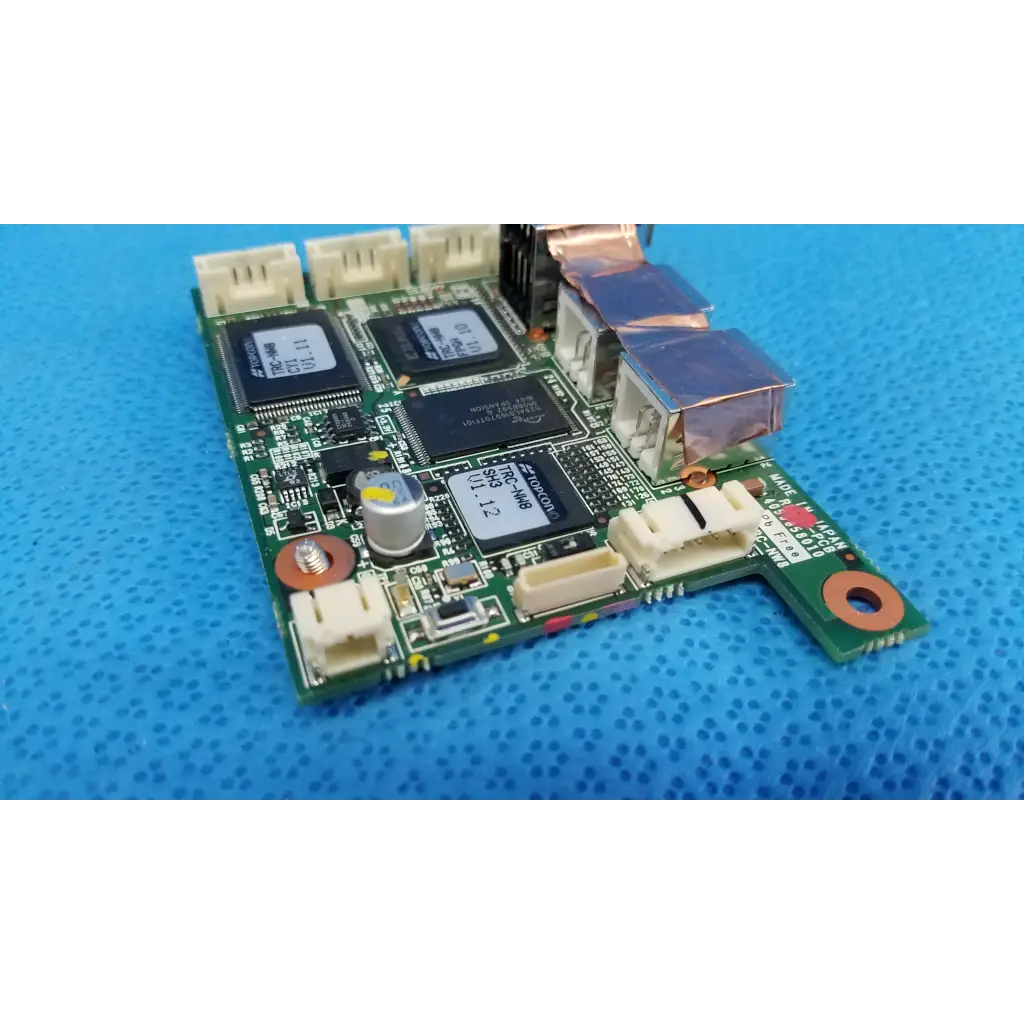 Green logic motherboard board with black integrated circuits and usb ports for topcon fundus retinal camera