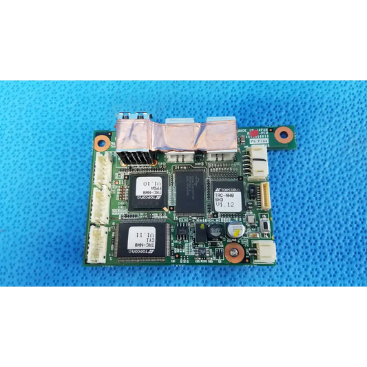 Green logic motherboard board with black integrated circuits and copper heat sinks for topcon fundus retinal camera
