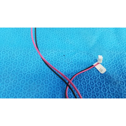 A pair of thin pink and black insulated wires with white connector for rotary solenoid aperture diaphragm sap1-t115b