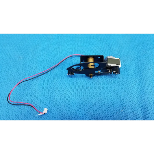Black plastic and metal rotary solenoid aperture diaphragm with gold roller and pink black wire for topcon fundus camera