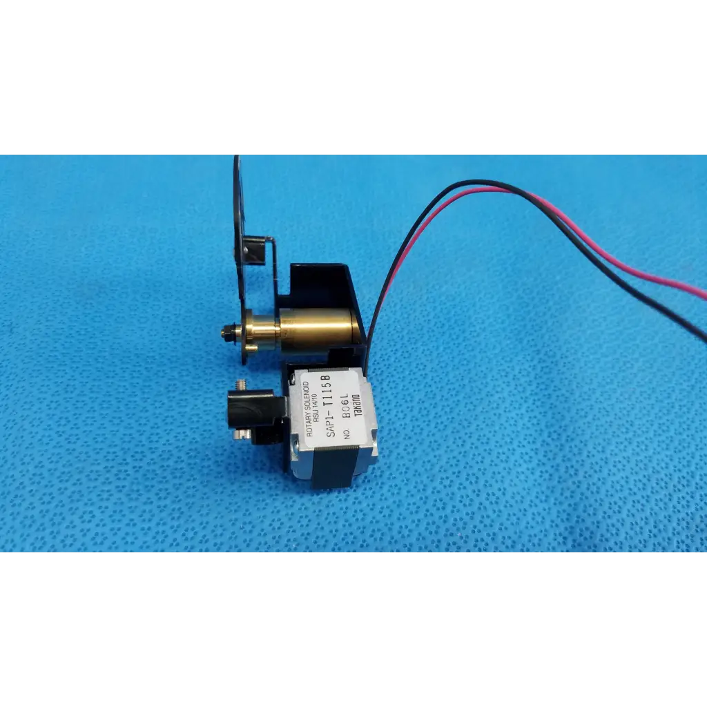 Black and brass rotary solenoid aperture diaphragm with attached wires for internal takano sap1-t115b in topcon camera