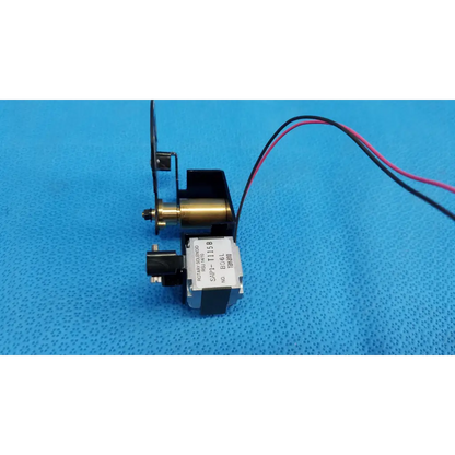 Black and brass rotary solenoid aperture diaphragm with attached wires for internal takano sap1-t115b in topcon camera