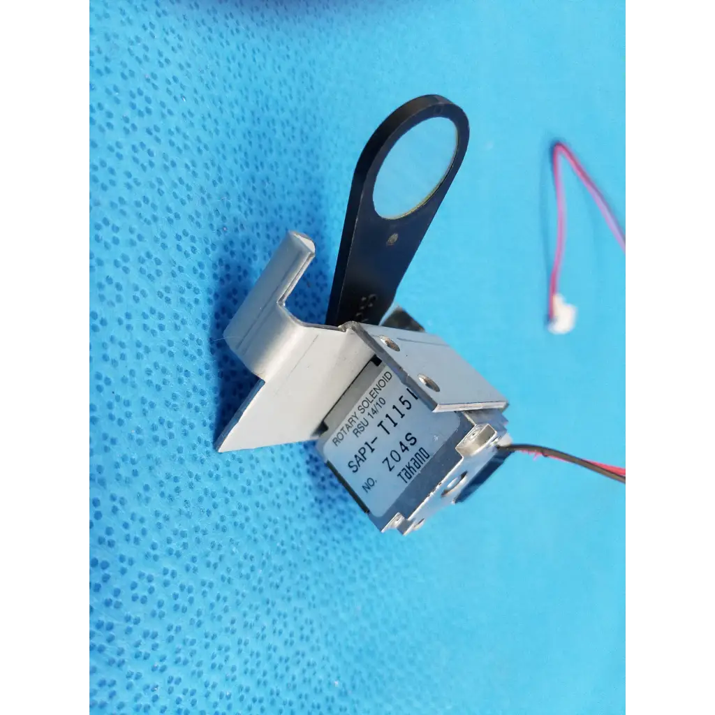 Internal Takano silver rotary solenoid filter shutter with black handle and red white wires for Topcon TRC-NW8 fundus camera