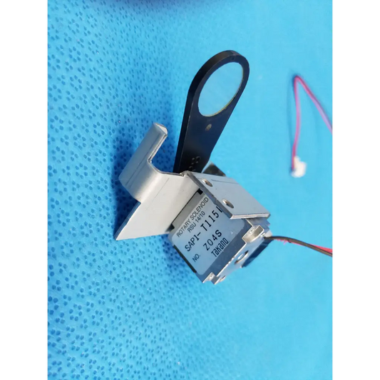 Internal Takano silver rotary solenoid filter shutter with black handle and red white wires for Topcon TRC-NW8 fundus camera
