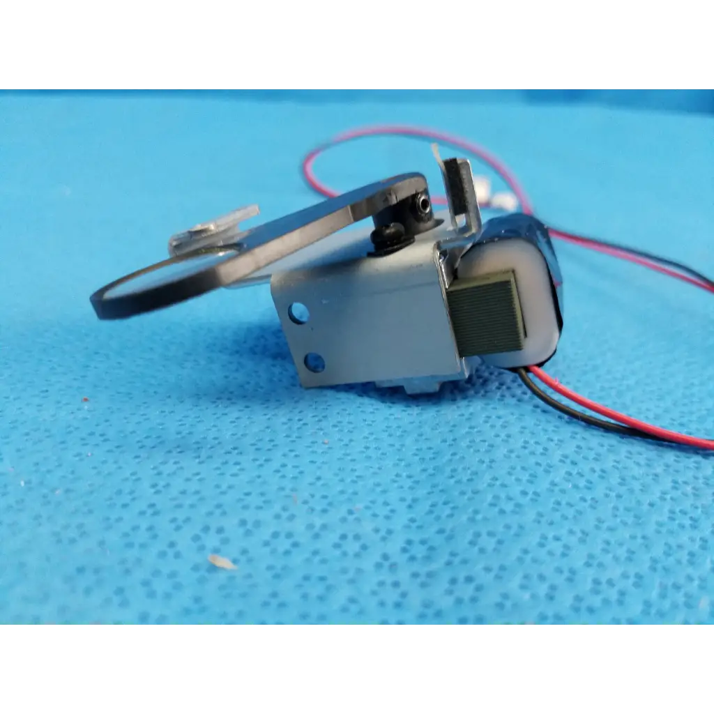 Silver metal internal takano rotary solenoid filter shutter part with gear and red black wiring for topcon fundus camera