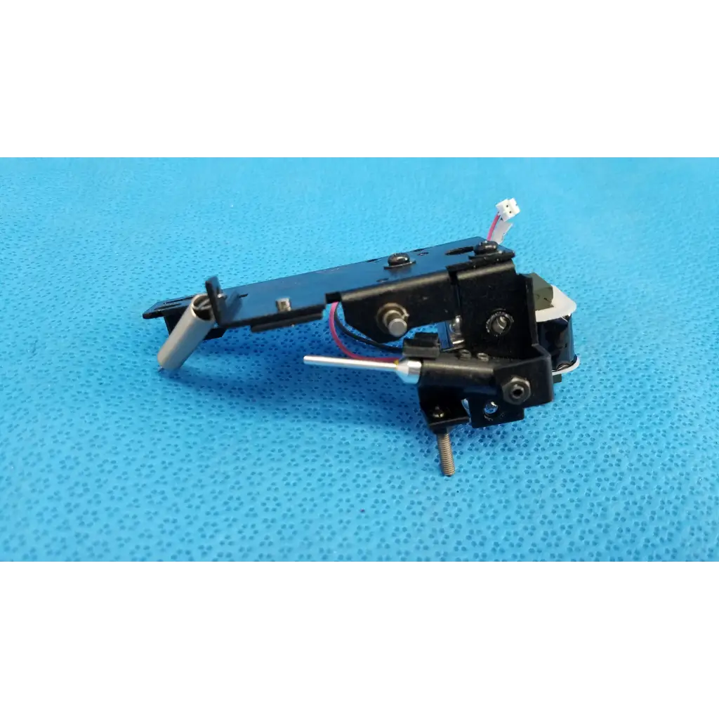Black plastic and metal rotary solenoid mechanical switch cartridge with silver stylus for topcon fundus camera