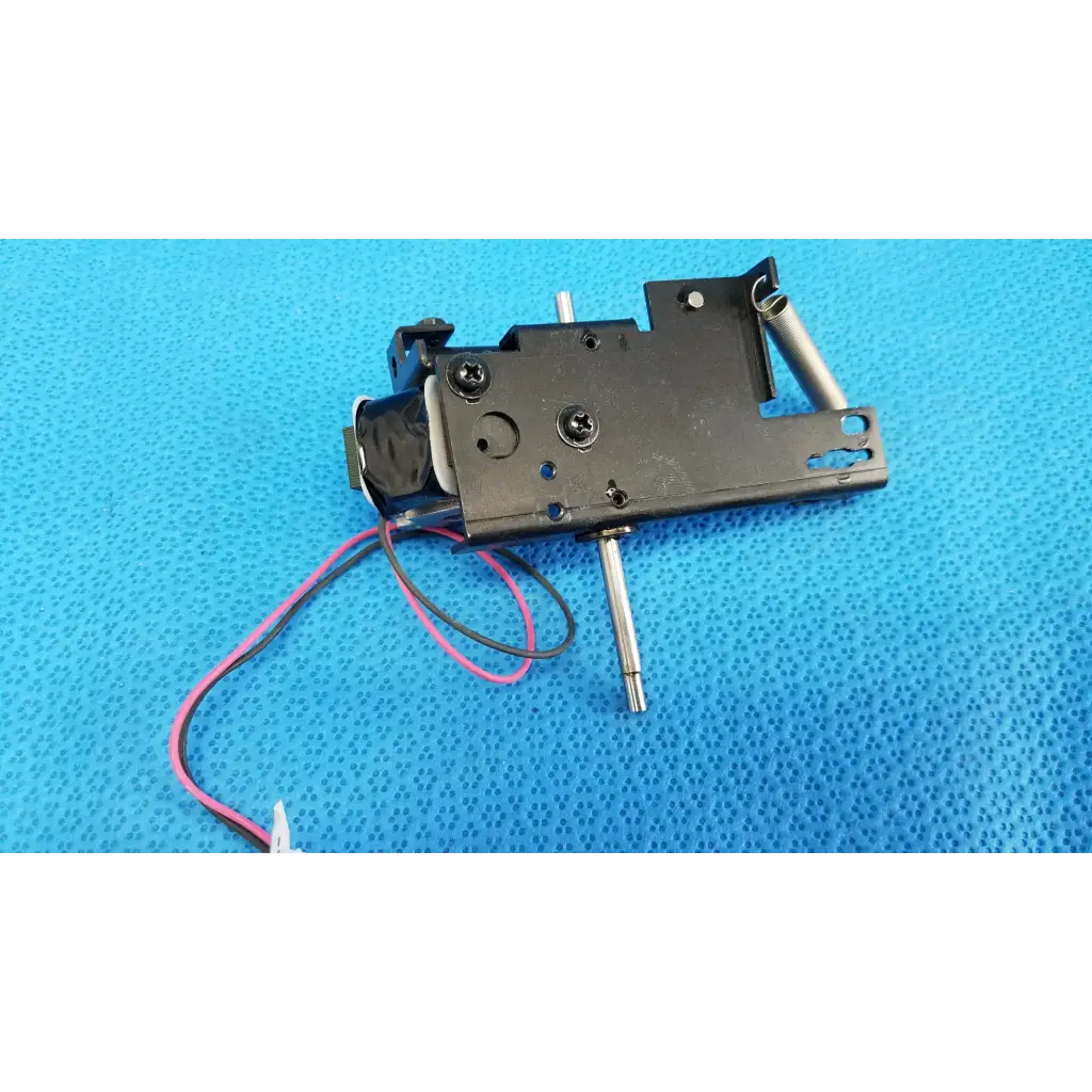 Black metal rotary solenoid mechanical switch with silver shaft and pink black wires for Topcon retinal camera