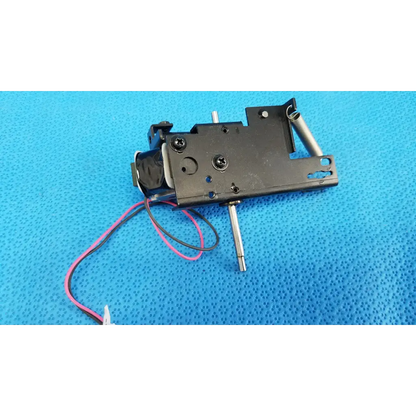 Black metal rotary solenoid mechanical switch with silver shaft and pink black wires for Topcon retinal camera