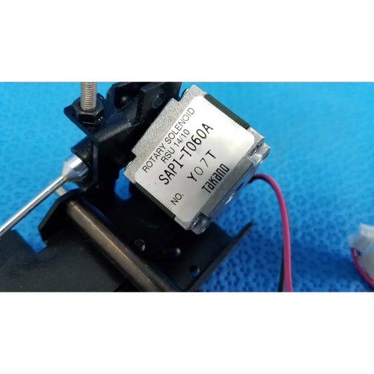 Silver-colored rotary solenoid mechanical switch with black housing and red wire sap1-t060a by takano for topcon camera