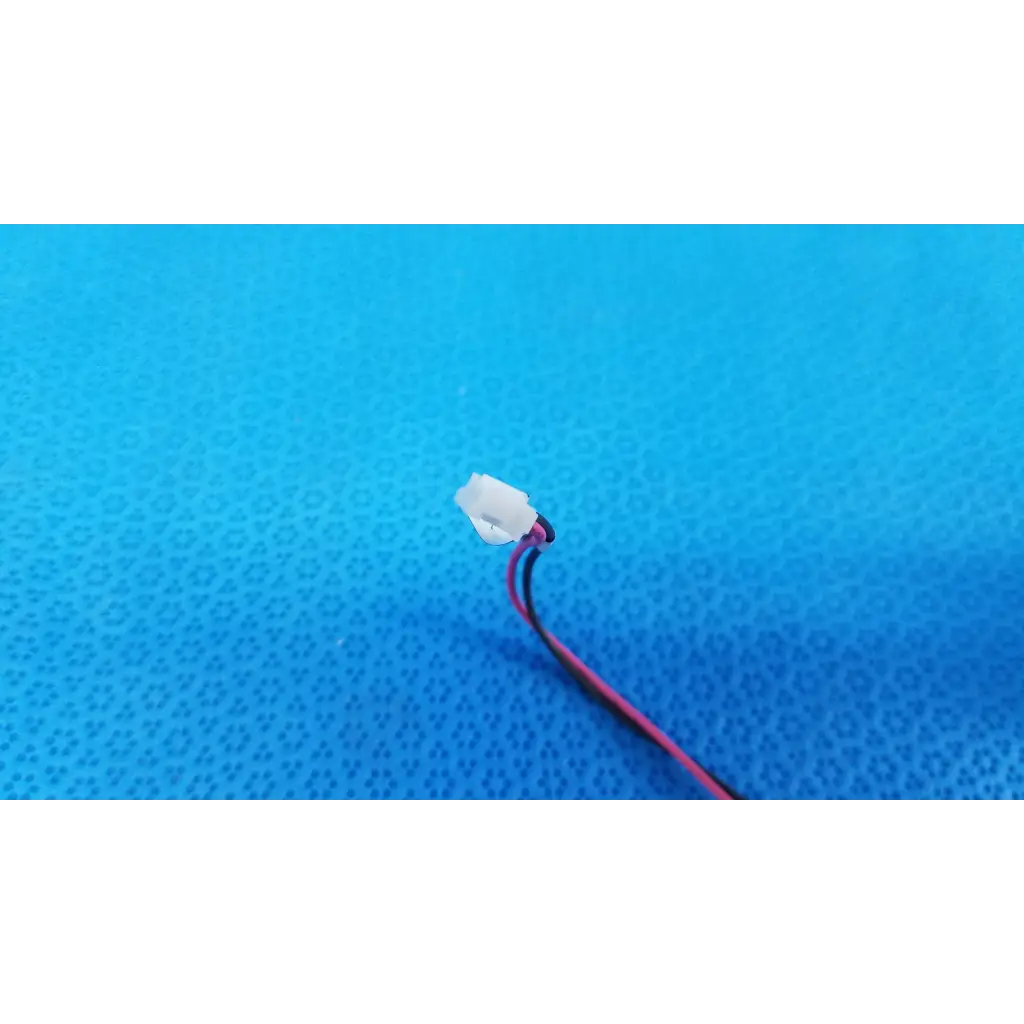 White plastic internal takano rotary solenoid with red and black wires for topcon fundus retinal camera model trc-nw8