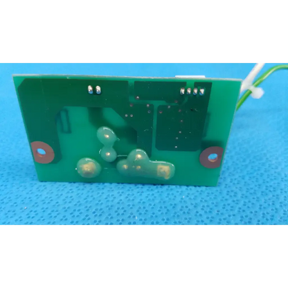 Green rectangular circuit board with translucent green components and copper traces xenon flash trigger for topcon fundus camera