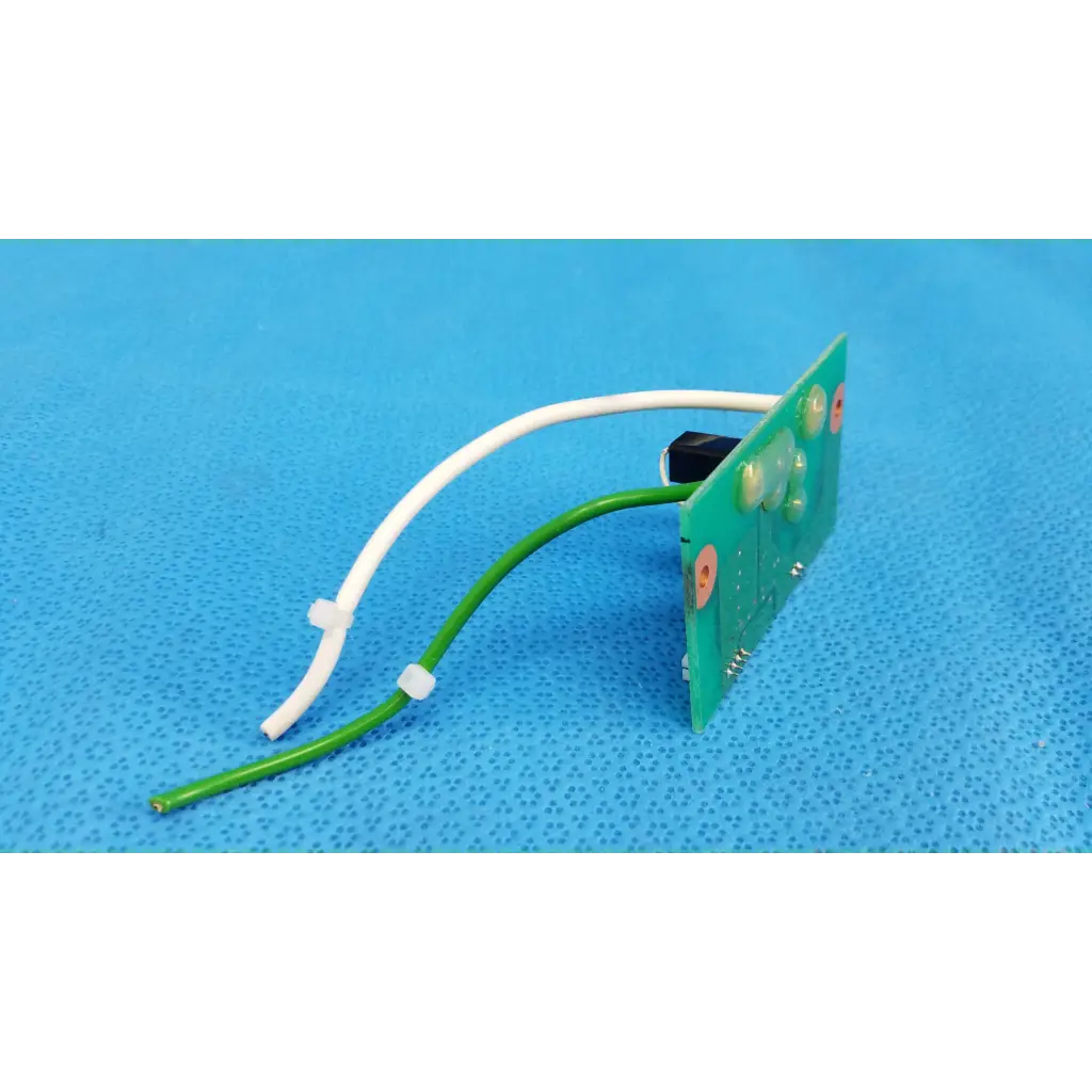 Green circuit board with white and green wires and black component for xenon flash trigger pcb board for topcon fundus camera