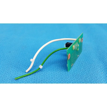 Green circuit board with white and green wires and black component for xenon flash trigger pcb board for topcon fundus camera