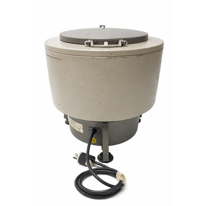 Beige biomed certified centrifuge with gray lid and black power cord by international equipment company