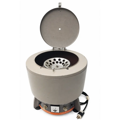 Gray international equipment company hn-s centrifuge biomed certified with open circular lid and orange-accented base