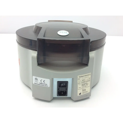 Gray and black iris statspin express 4 high-speed centrifuge with transparent front panel for lab use
