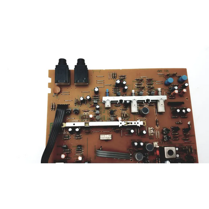 Brown jalco power supply circuit board with black connectors blue and white capacitors and central metallic slider switch bbbdg2-7