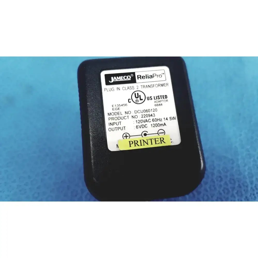 Black plastic jameco reliapro plug-in class 2 transformer with white label showing transformer input 120 vac model details