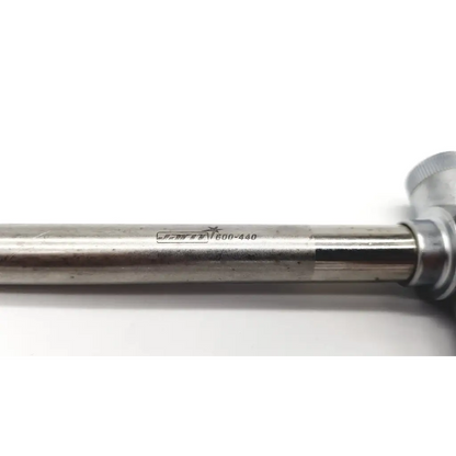 Jarit 600-440 silver metallic piston valve cannula with engraved markings and threaded end cap with pyramidal trocar
