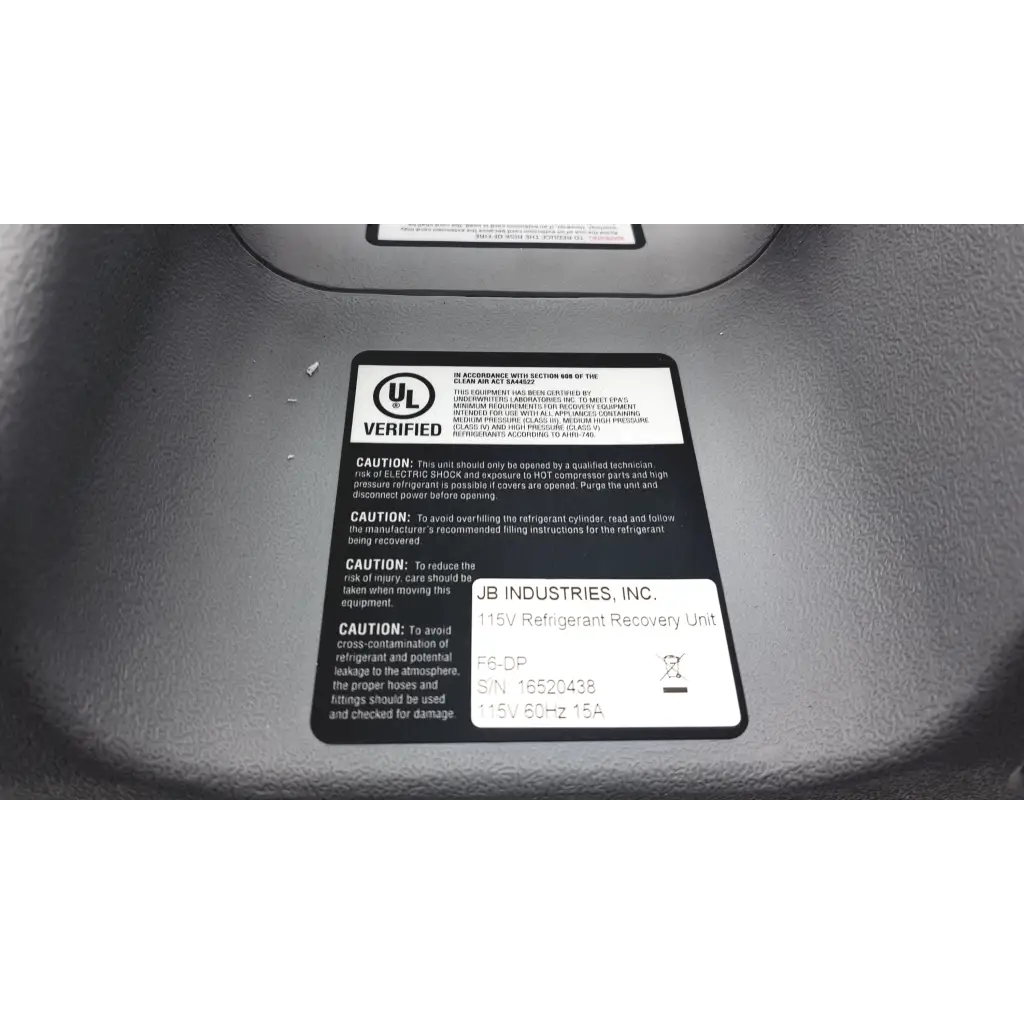Black and white label on jb industries inc piston refrigerant recovery unit for efficient refrigerant recovery
