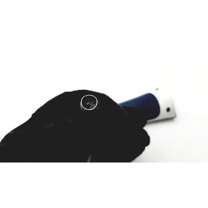 A black-gloved hand holds a chrome socket wrench with blue and white handle for jadak barcode scanner use