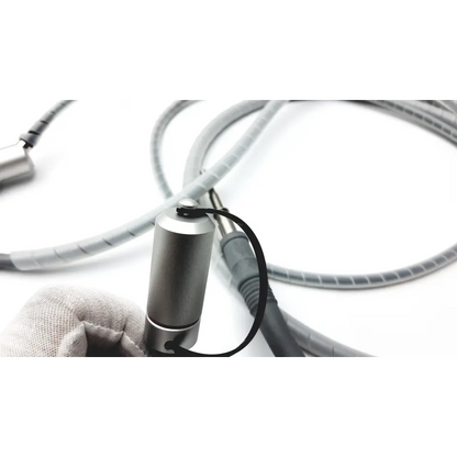 Silver cylindrical jedmed 39-8160 video otoscope head with camera attachment and gray coiled cables connected