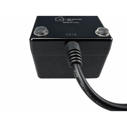 Black rectangular indoor heater with textured sides and clear caps on top by jerome industries power supply adapter
