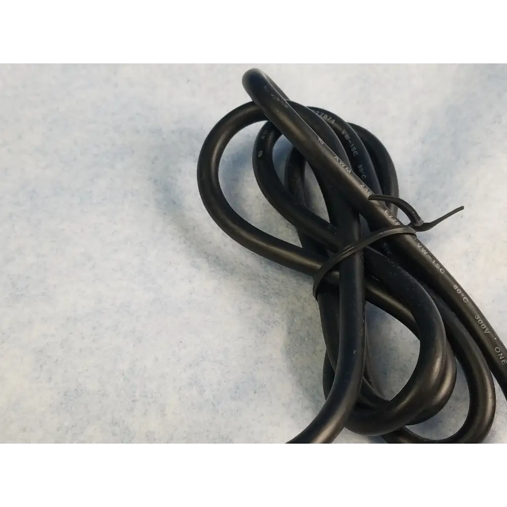 Black coiled power supply adapter cord with printed specifications for jerome industries iltk-51 power supply adapter