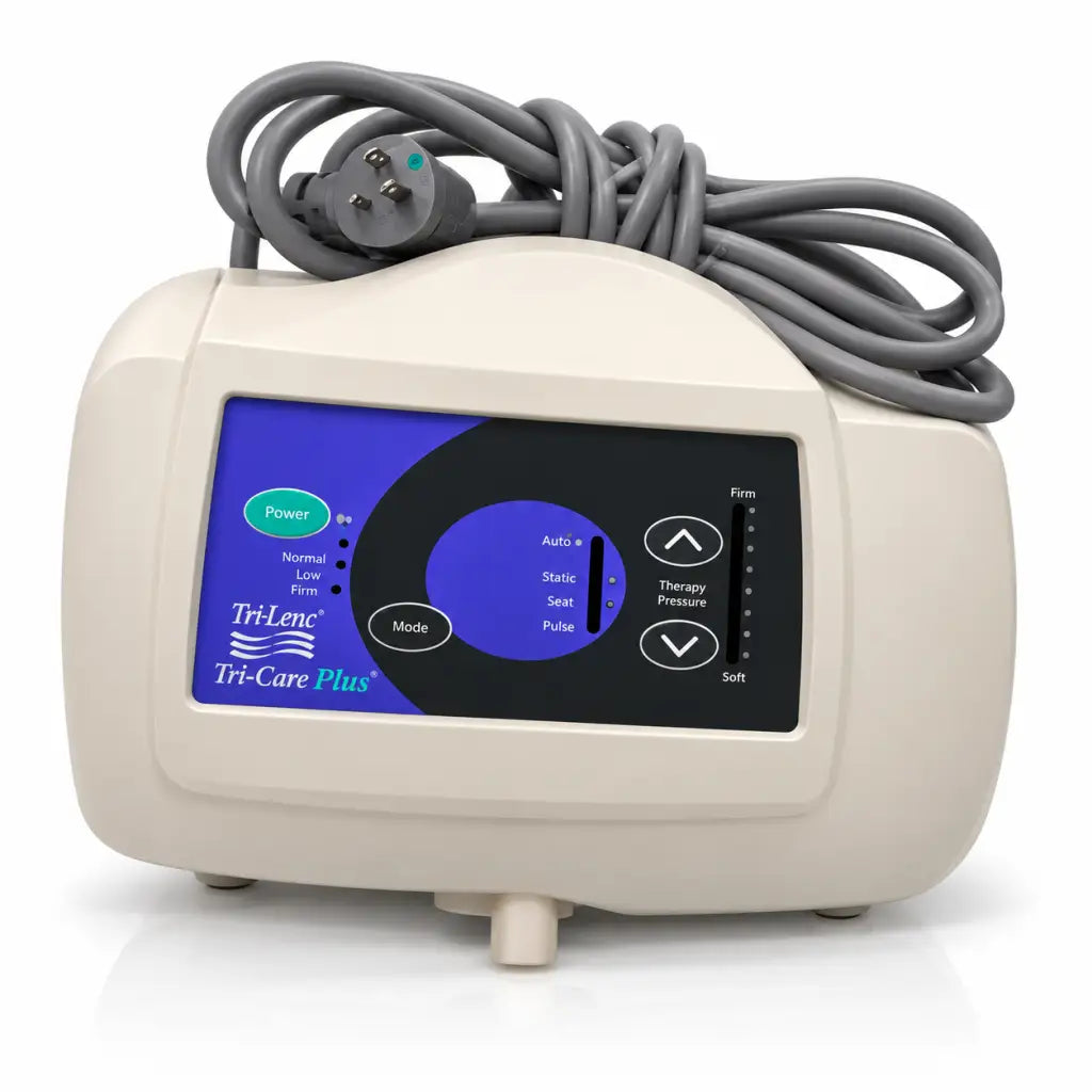 Cream-colored joerns tri-line txcair plus hospital air mattress pump control unit with blue black control panel and therapy buttons