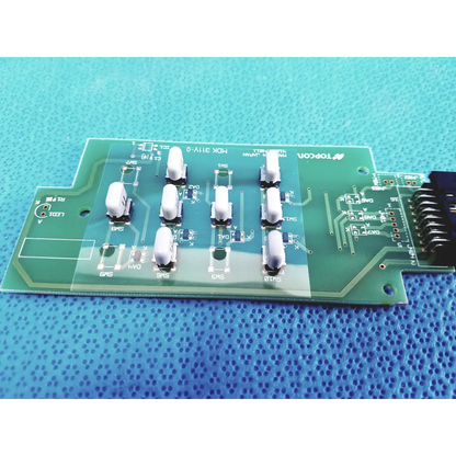 Green pcb board with white components and silver traces branded topcon for fundus retinal camera joystick model 4182074011