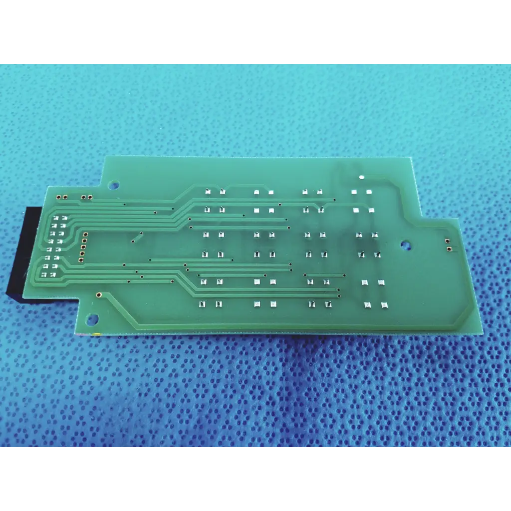Green rectangular pcb board with silver conductive traces and solder pads for topcon fundus retinal camera use