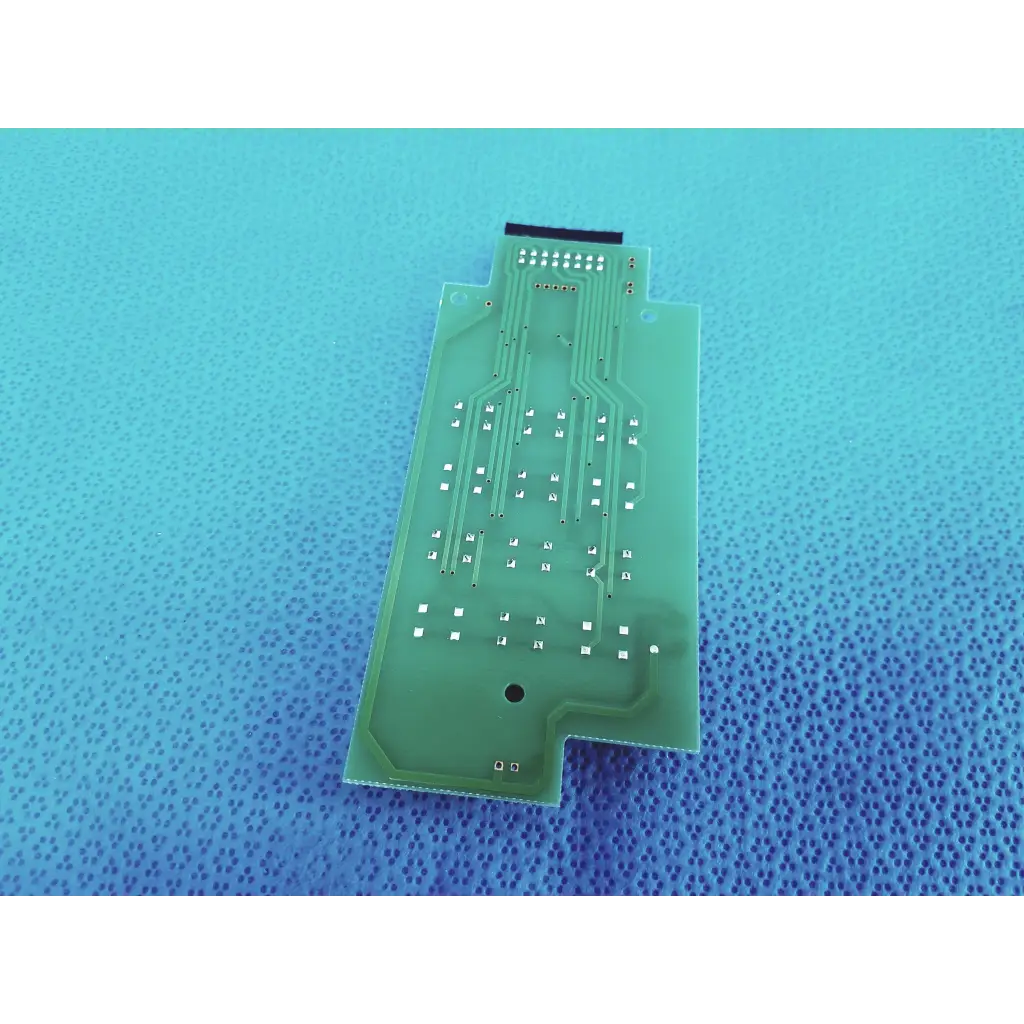 Green pcb board with silver conductive traces and solder pads for joystick 4182074011 in fundus retinal camera