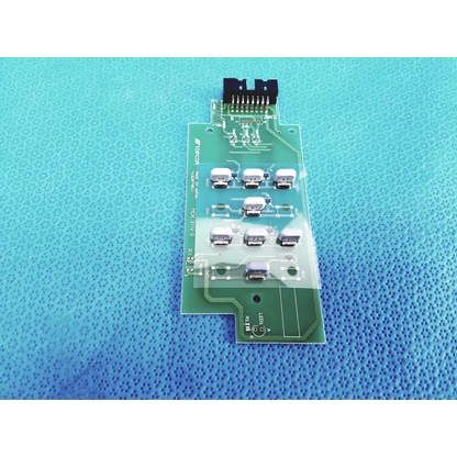 Green pcb board with white rectangular components and black connector for topcon fundus retinal camera joystick