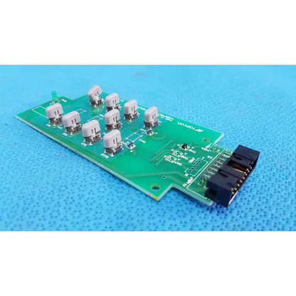 Green printed circuit board joystick base control button matrix pcb with beige toggle switches and black usb connector