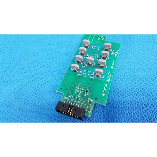 Green rectangular joystick base control pcb with ten gray switches and black connector for topcon retinal camera