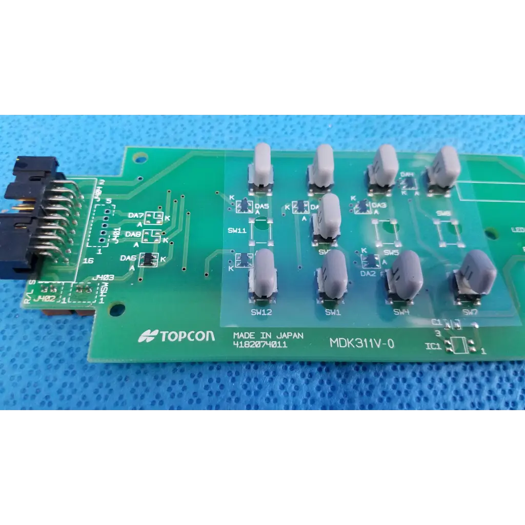 Green topcon mdk311v-0 joystick base control button matrix pcb with gray switches and black connectors for retinal camera
