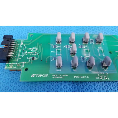 Green topcon mdk311v-0 joystick base control button matrix pcb with gray switches and black connectors for retinal camera