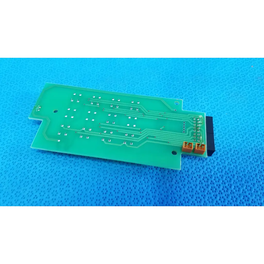 Green rectangular joystick base control button matrix pcb with silver traces and orange connectors for topcon retinal camera