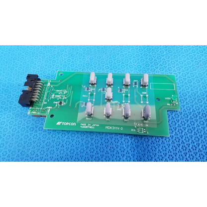 Green topcon mdk311v-0 circuit board with gray switches and black connector joystick base control for retinal camera