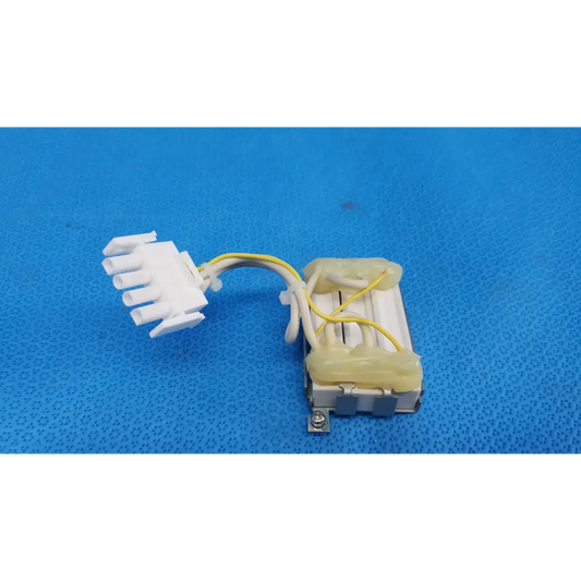 White plastic connector with yellow wiring attached to metallic resistor block assembly for topcon retinal camera