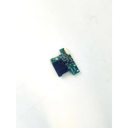 K750543-00 circuit board showing green pcb with black plastic component and gold-colored connector pins