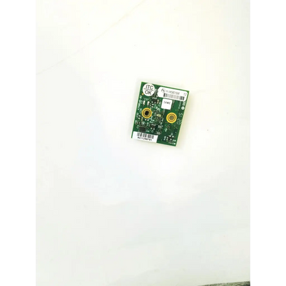 Green k750545-02 circuit board with gold circular connectors and white labels for electronic device applications