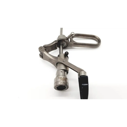 Silver surgical instrument with black handle and engraved markings karl storz 27040e working element product image