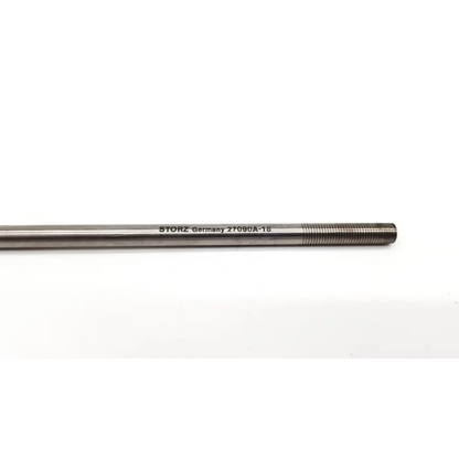 A sleek metallic silver karl storz 27090a-18 telescoping dilation rod with threaded end and engraved text
