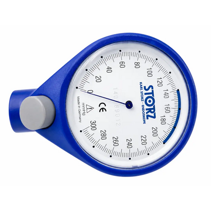 Blue plastic karl storz biomed certified pressure gauge with white dial and black mmhg markings and tubing