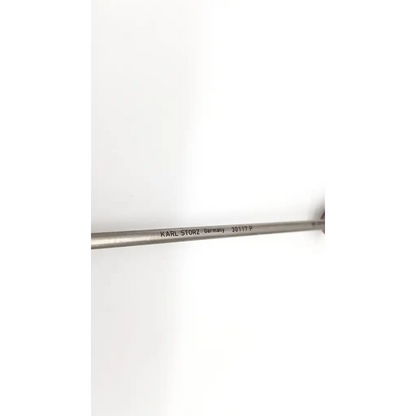 Silver metallic shaft of karl storz 30117p trocar with engraved storz 30117p germany text
