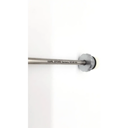 Silver metallic karl storz reduction sleeve da54- with hexagonal head and engraved 30140 ka text